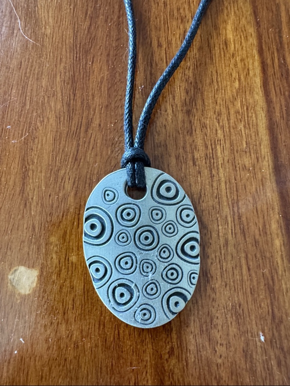 Black and Silver Circular Pattern Oval Pendant Necklace